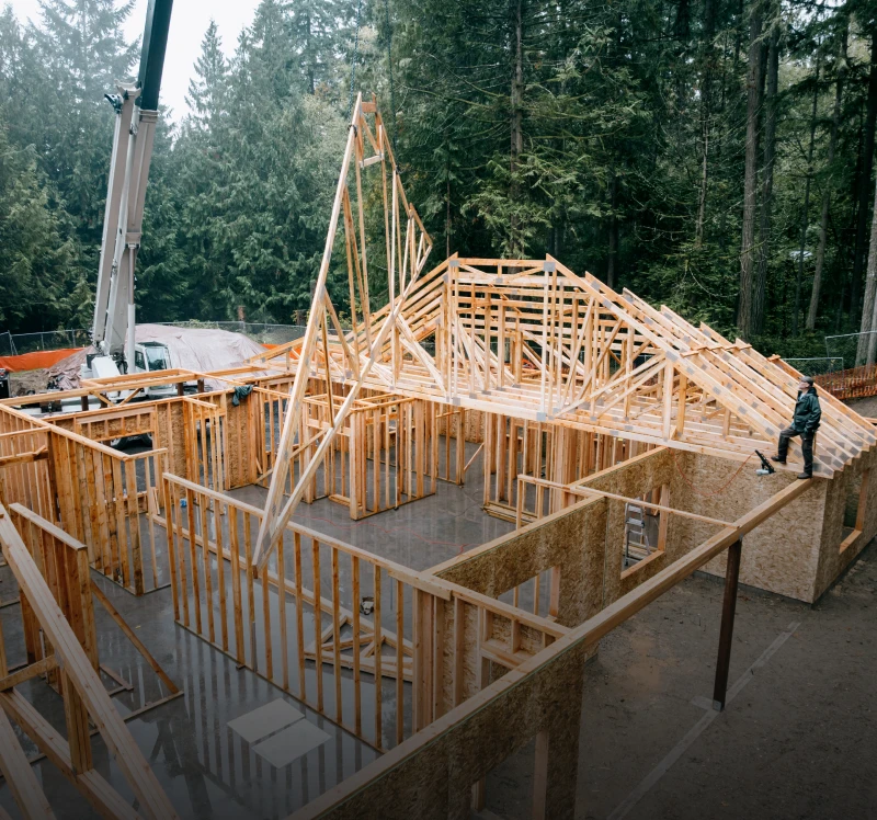 House under construction with wooden framing